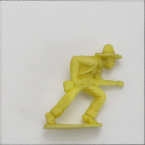 Cowboy laufend mit Gewehr im Anschlag, (K) Gelb